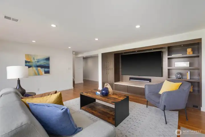 Downstairs media area with 77" TV and Sonos sound bar