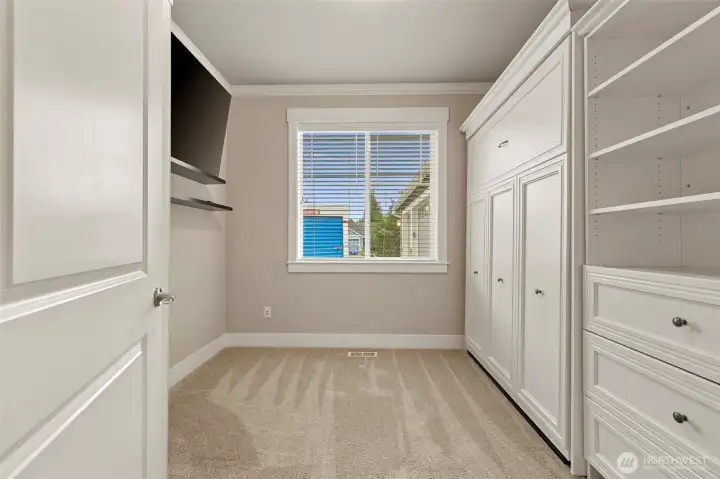 Wall Bed allows for flexibility for this bedroom.