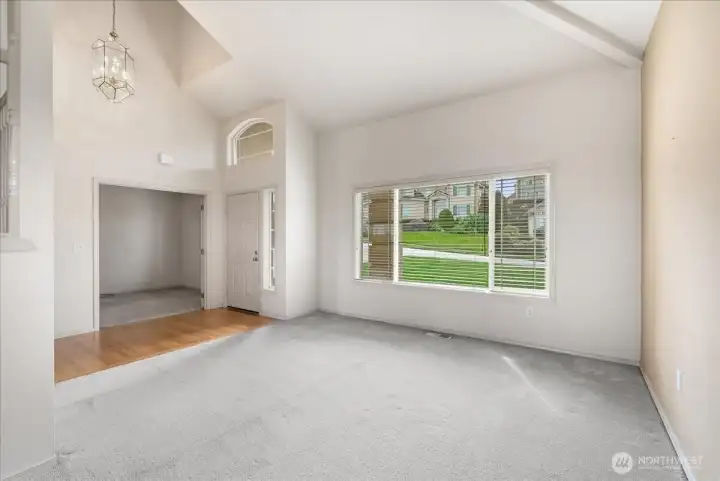 Living room, den and entry views.