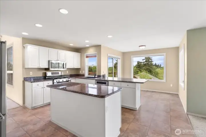 Kitchen eating area with so much light.  It's always light and bright here.  There is a fantastic Mt. Rainier view also.