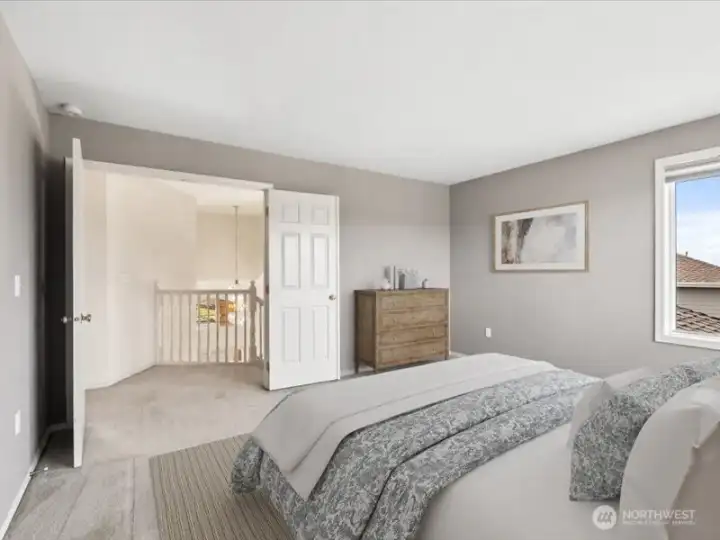 Virtually staged primary bedroom.
