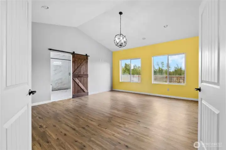 Primary suite with French door entry.