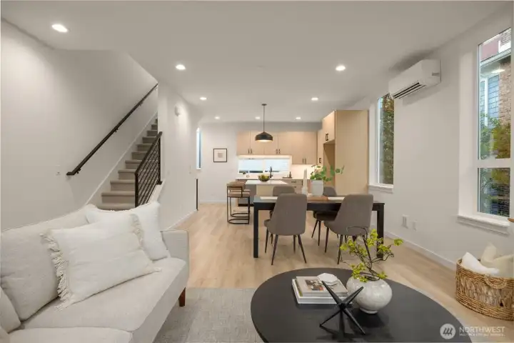 Cozy family room/den space transitions beautifully down the hallway toward the back of the home. (photos are of model home, similar finishes & quality)