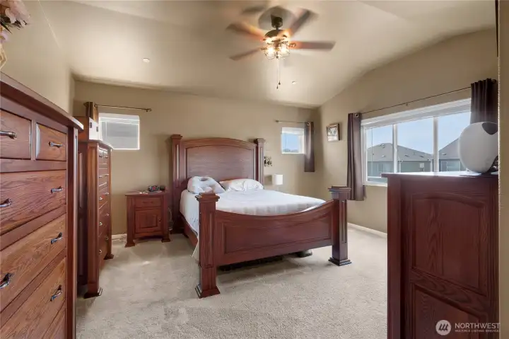 Primary off front of the home is spacious and offers great natural light with ceiling fan. Primary off front of the home is spacious and offers great natural light with ceiling fan.