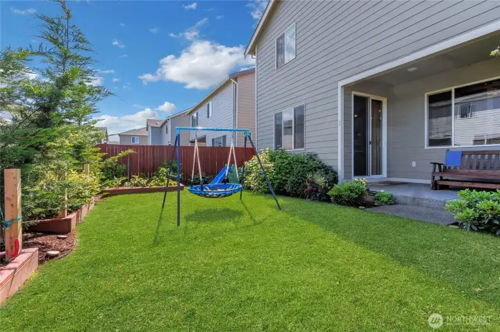 Looking at covered patio and grass area. Looking at covered patio and grass area.