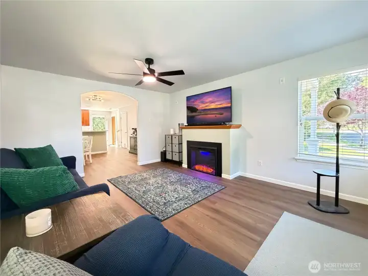 Comfortable size living room with new electric fireplace.