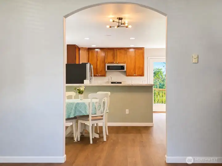 From the living room to the dining room and kitchen.