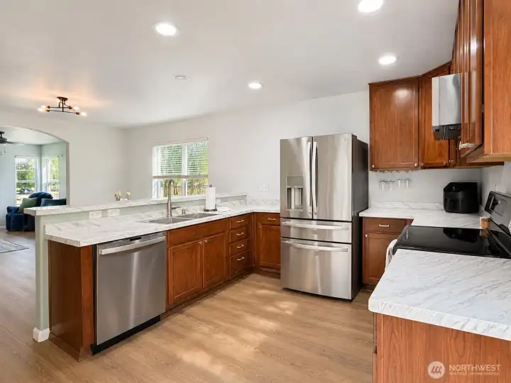 Stainless appliances and sink.