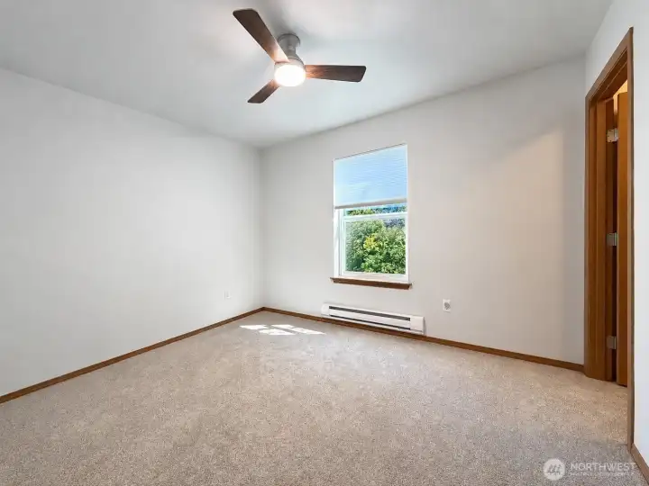 Spacious bedroom #3, also with ceiling fan.