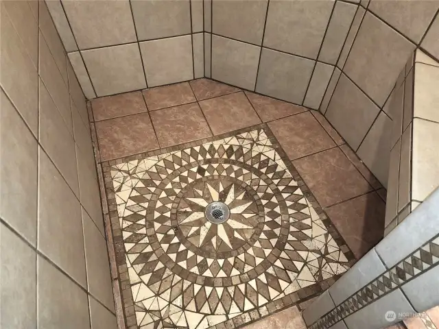 Beautiful tile work in the primary bathroom shower