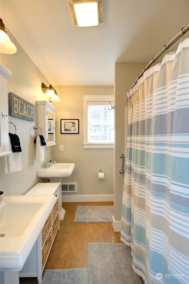 The primary bath offers dual vanities.
