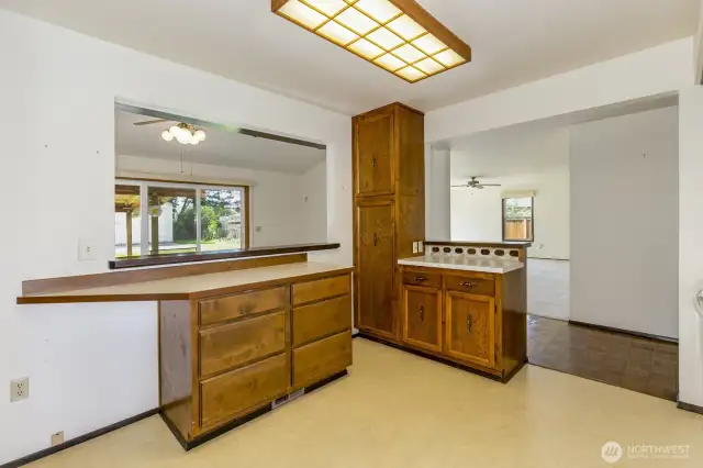 The pass through is perfect for staging the food for the dining room.