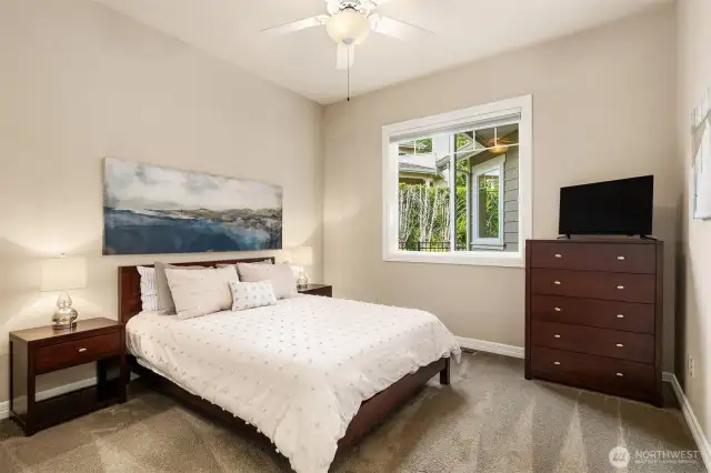 Main floor bedroom wing offers 2 bedrooms, both en-suite, with walk in closets