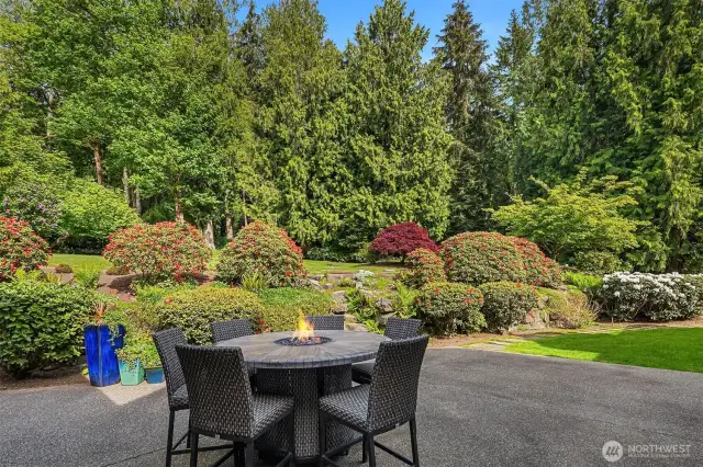 Terraced park like yard with multiple entertainment pads
