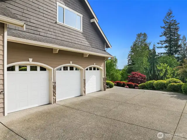 3 car oversized attached garage with plenty of space for shop There is even a ramp to home for no stair access. New furnace and heat pump in stalled in 2022