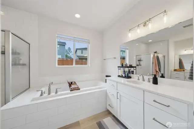 Gorgeous primary bath with two separate sinks/ counters