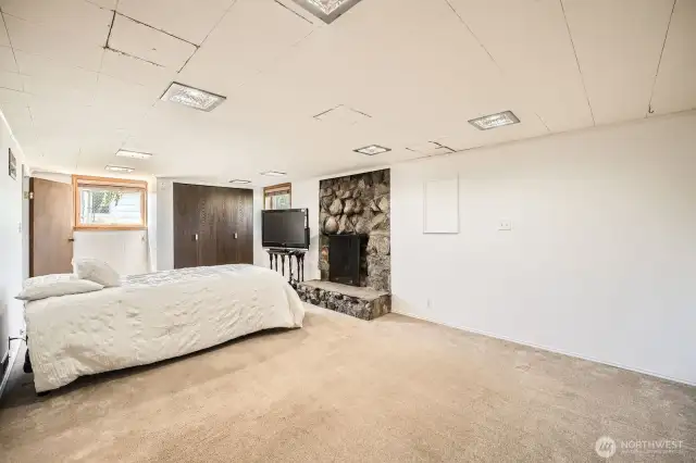 Downstairs Bedroom #1 with Wood Burning Fireplace