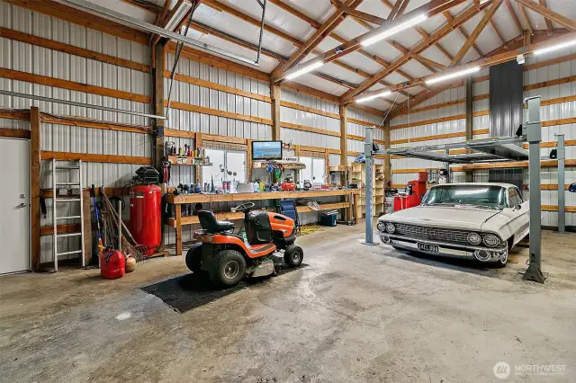 Car lovers rejoice in this huge 1200 sf shop with a lift!