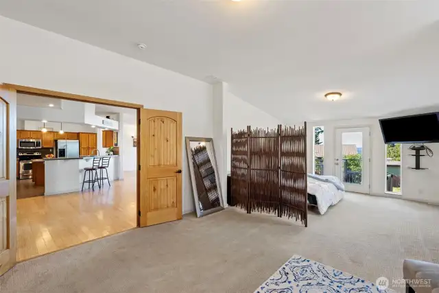 Primary room with double doors & walk in closet