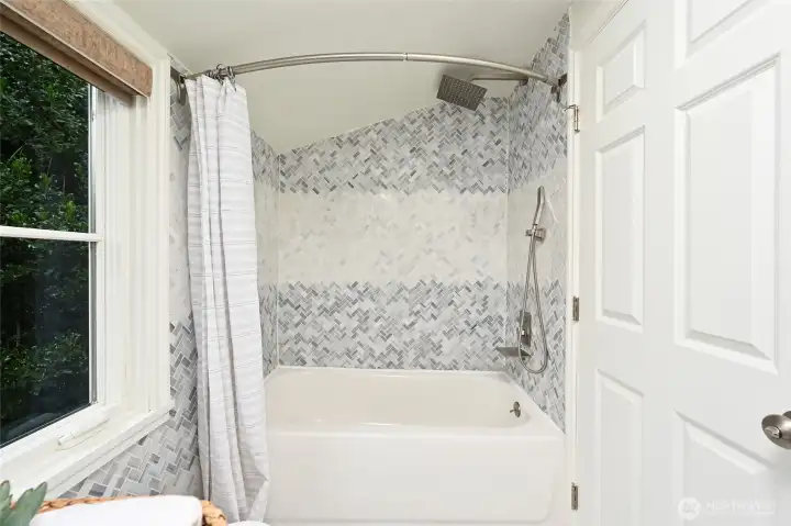 Updated upstairs full bathroom- two sing vanity is on the opposite wall (not shown)