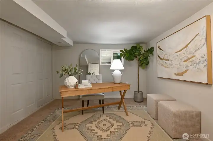 Office on the lower level with a large closet