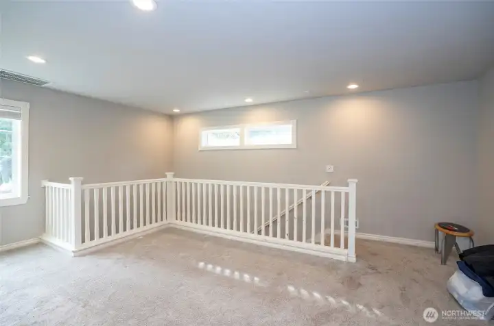 Graceful stairway creates a stunning transition to the second floor