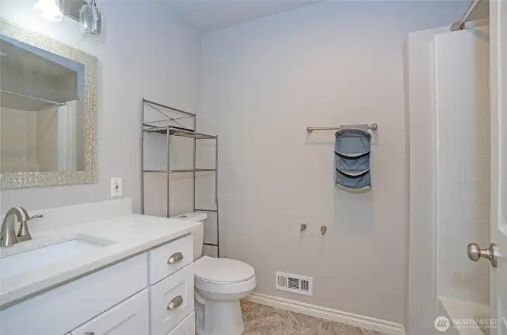 Well-appointed guest bath designed for comfort and convenience