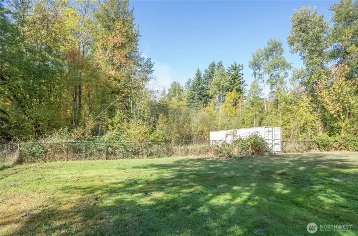 Yet another angle showcasing the beauty of the backyard and grounds. Your new home awaits!