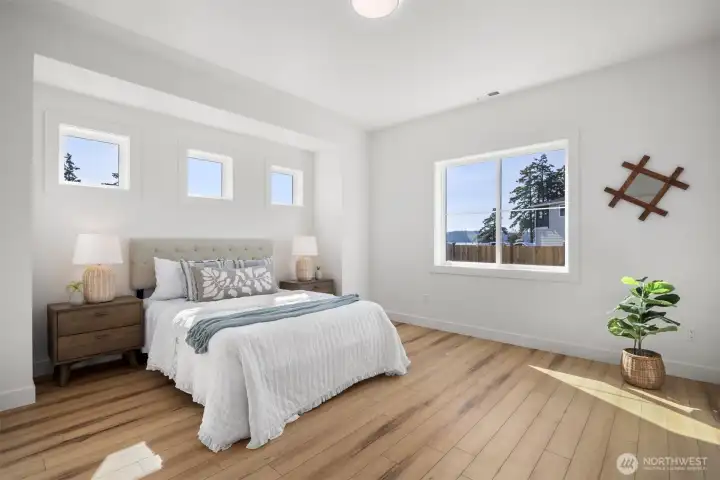 The primary suite is very spacious and has saltwater views.