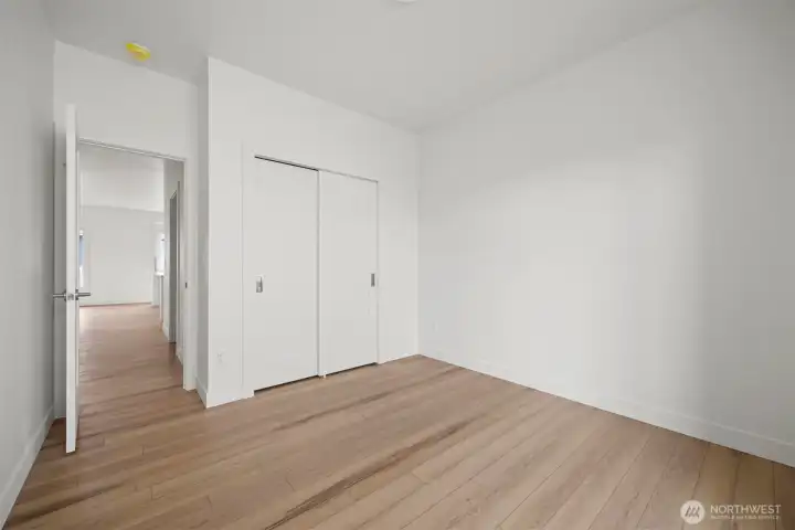 Looking from the third bedroom towards the kitchen.