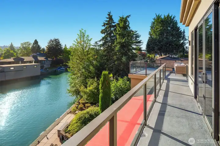 Deck access overlooking the canal from the primary retreat