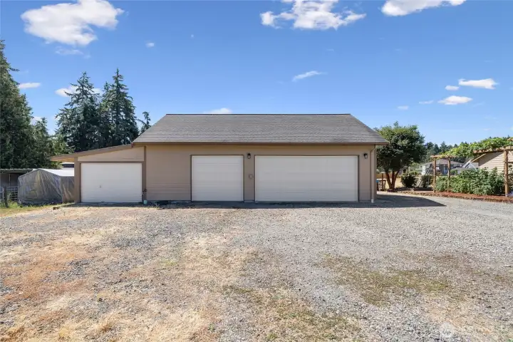 The garage and shop are fully insulated and equipped with a ductless heat pump for year-round usability. The space is piped for an air compressor, which stays with the property, and includes a 50-amp outlet for electric vehicle charging. Built-in cabinetry and a mini fridge are included, along with a dedicated gun safe cabinet (safe not included). A 220-volt welding plug and a 200-amp service panel support a wide range of uses.