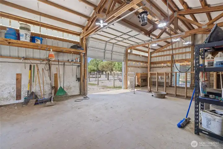 Barn- A car-charger plug is in place for added convenience. The space also features built-in livestock feeders, dedicated hay storage, and a defined pen area with durable concrete flooring. Cross-fencing and effective field drainage complete the setup.