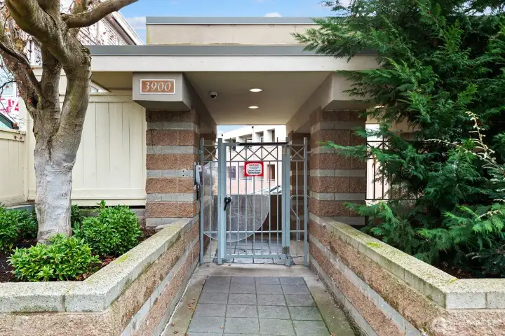 The main entry gate from 2nd Ave NW. Security gate #1 then down some steps to the 2nd Security gate. the The Butterfly security box is on the left and you enter by requesting entry from the owner or tenant.