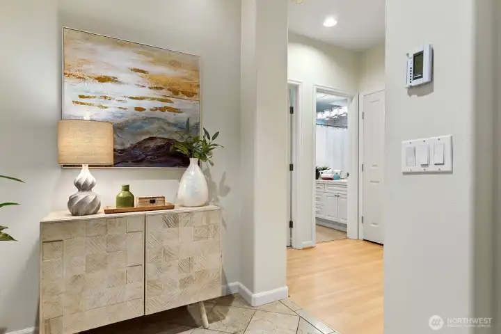 Entry into your new home. You can see the main bath and barely the door jam to the 1st bedroom.