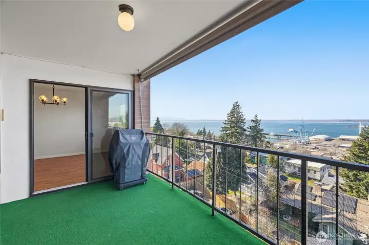 Slider to the covered view deck with powered sun shade and propane BBQ (stays)