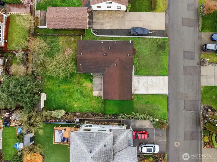 The perfectly flat lot is 7,500 sq ft and allows for multiple possiblities.