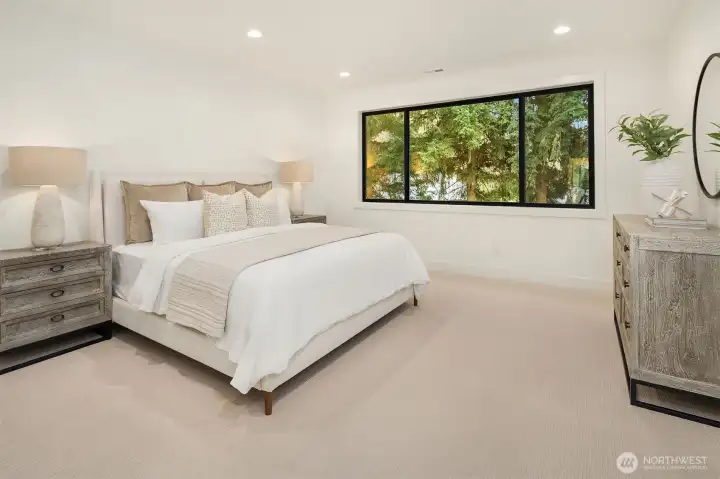 Designer primary suite with five-piece bath & heated floors