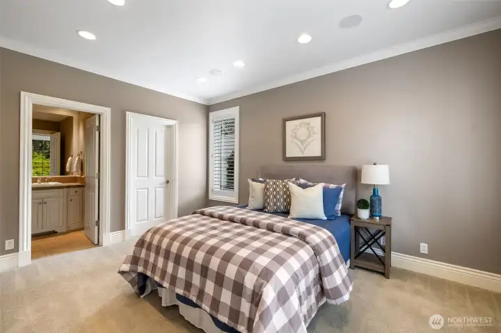 Main floor guest bedroom with a 3/4 bath.