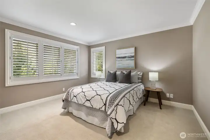 Additional secondary bedroom with a private full bath.