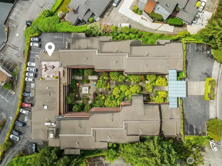 top down view showcasing front entrance, guest parking directly in front of entrance. top down view showcasing front entrance, guest parking directly in front of entrance.