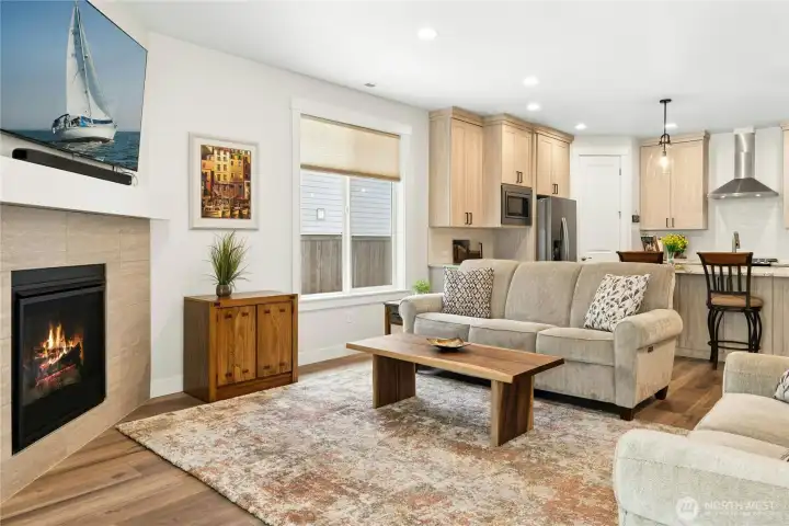 Cozy natural gas fireplace centers the large great room