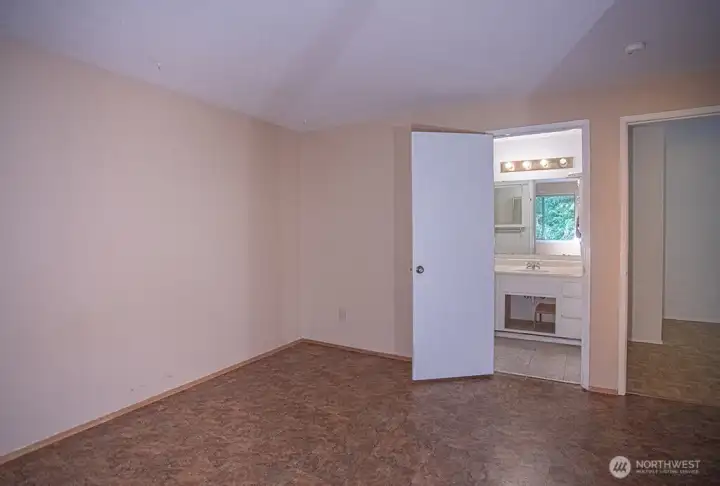 back right bedroom with access to the bath