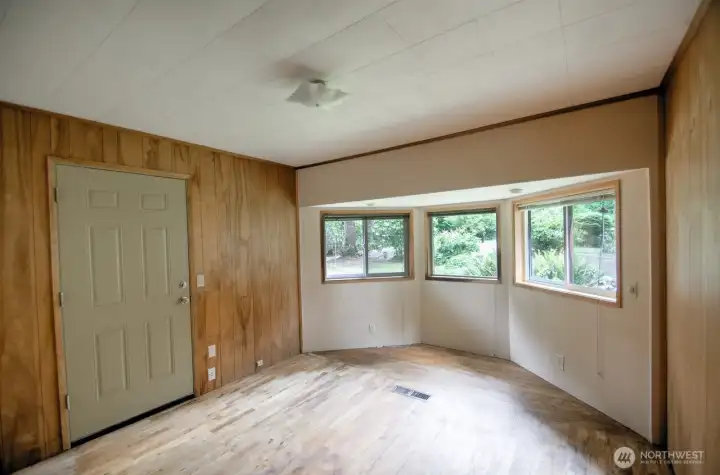 ...and two with hardwood floors exposed.