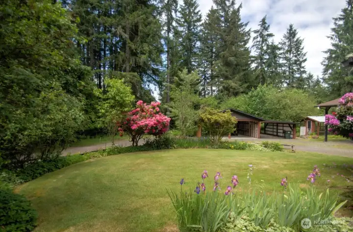 There are lovely grounds abounding the home site. Open grassy play spaces and
