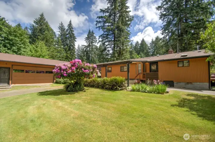 Besides the open greenspace and acres in back, there is lots of room for tinkering, vehicles and family members to live or visit!