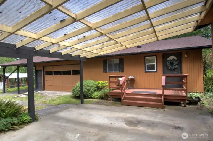 Through the carport, you've got cover to make your way to the apartment on site.