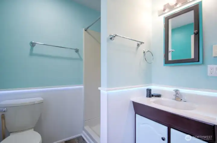 ...and there is a convenient 3/4 bathroom to these spaces and the garage too!