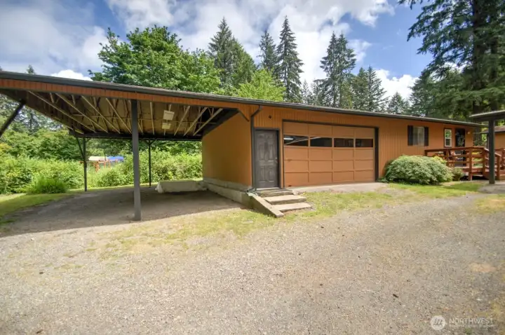 New roofs were installed on both this building and the main home in fall 2025.