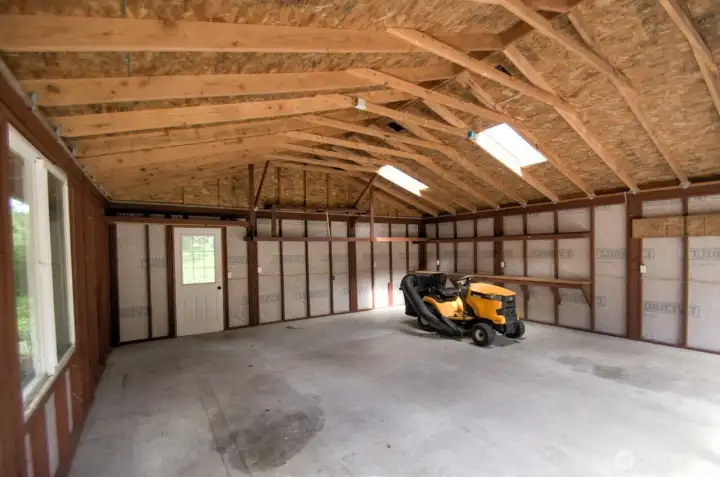 Inside the carport with two bays.